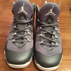 Grey and white Jordan's Nike