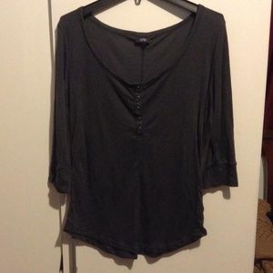 Gray shirt with bottons on front :)