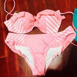 34 C VS bikini top with M bottom. Never worn.