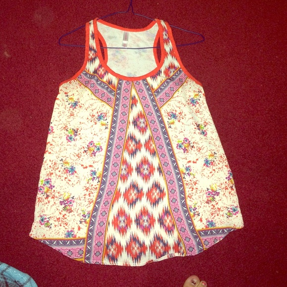 Only worn once, cute patterned tank top, and light