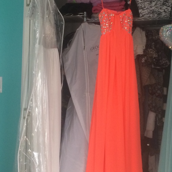 Selling this orange prom dress!