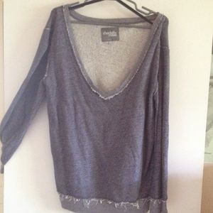 Oversized distressed & slouchy faded blue sweater.