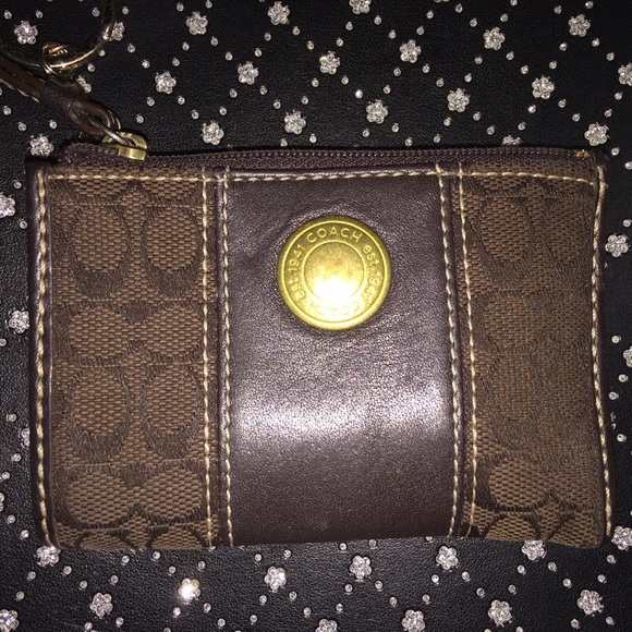 Dark brown Coach coin purse.