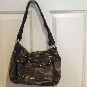 B. Makowsky camouflage soft handbag