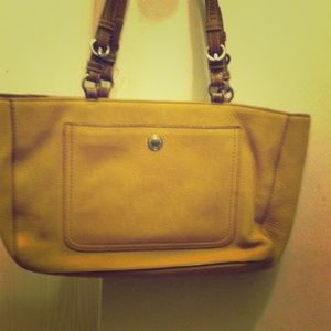 Tan Coach purse