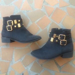 Black booties w/ gold buckles