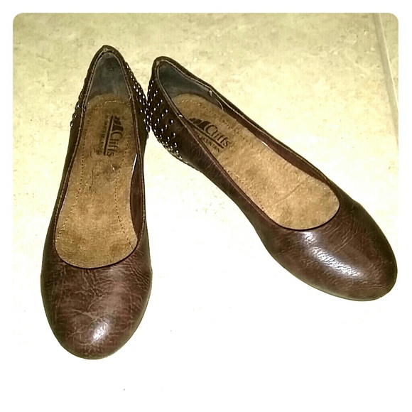 Never worn brown flats with gold stud accents