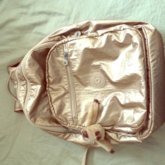 kipling gold backpack
