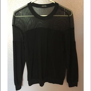 black sweatshirt with mesh detailing