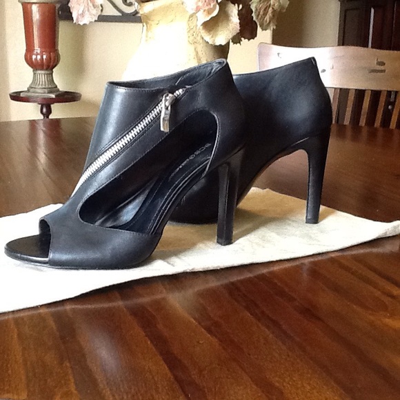 BCBGeneration Shoes - BCBG leather zipper cut out booties sz8 1/2 NWOT