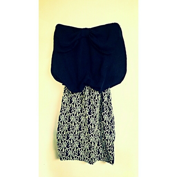 Dress has pretty bow at top, worn only once