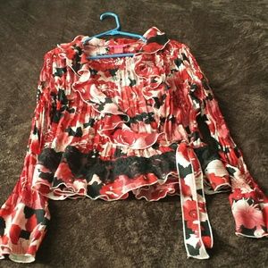 Floral dress shirt wrap at waist.