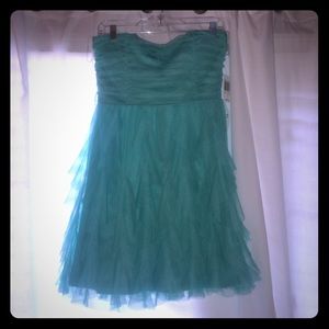 Blue/Turquoise strapless party dress.