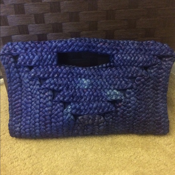 Never been used royal blue straw clutch