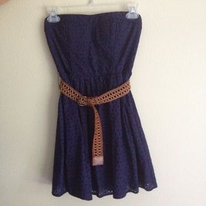 A navy blue floral lace dress
