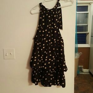 Black top with beige polka dots