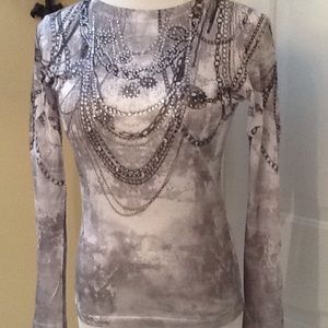 Jeweled cache top