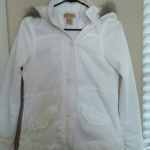 Cream jacket with faux fur hood