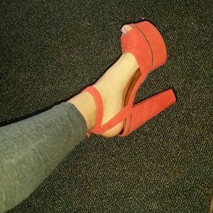 Disco heels in bright tangerine.