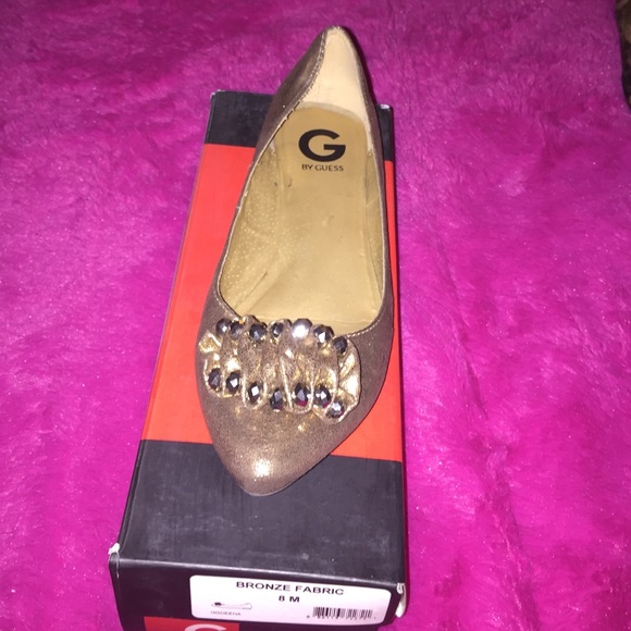 Gold pointy flats