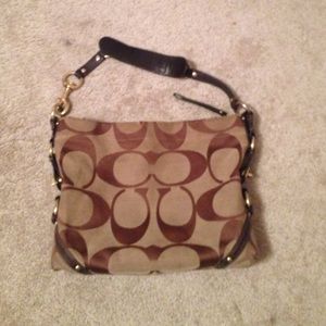Brown coach logo bag