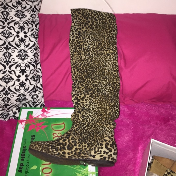 Over the knee flat boots