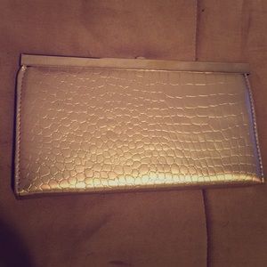 Gold tone reptile print wallet