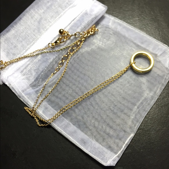 Gold karma necklace