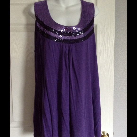 STRUT YOUR STUFF IN THIS SEQUINED TANK TOP