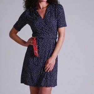 Adalie wrap dress in “Bright Navy Showtime Dot.”