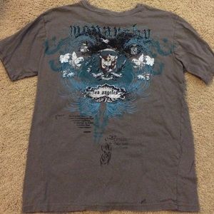 Grey black and blue Monarchy t shirt.