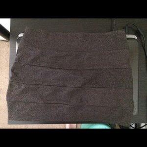 Black and gold mini bandage skirt