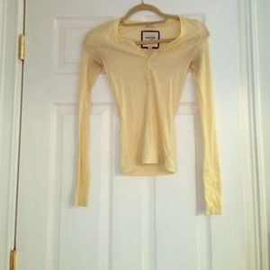 Yellow long sleeved shirt