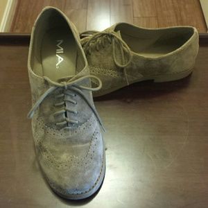 Classic taupe suede oxfords.
