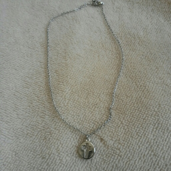 Silver hollow cross necklace.