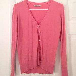 Peach colored cardigan