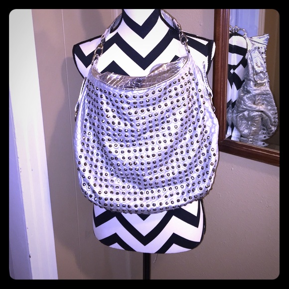 KouLon CarLston silver purse