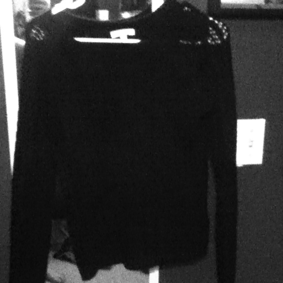 Cute black see through sweater with velvet bows.
