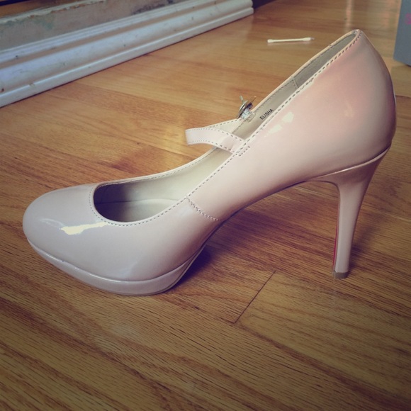 Nude strappy pumps