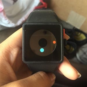 Black Nixon wrist watch