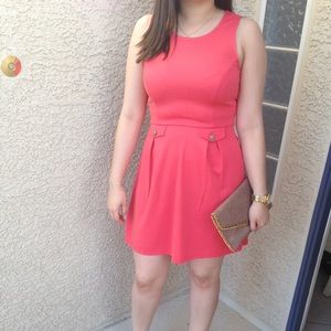 Pink dress with pockets.