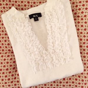 White ruffle blouse