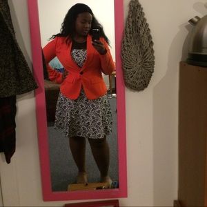 Orange blazer.