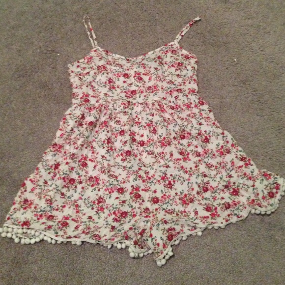 A red floral romper