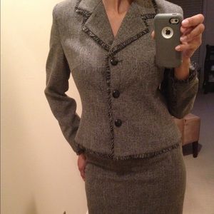 Grey suite w/ fringe lining. Needs seam fixed.