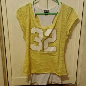 A "32" shirt with an attached tank top underneath