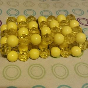 A yellow strechty beaded braclet
