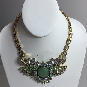 Gold Chain and Green Jeweled Necklace