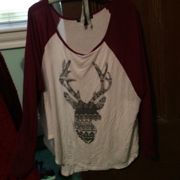 a maroon and white shirt. half sleeve.