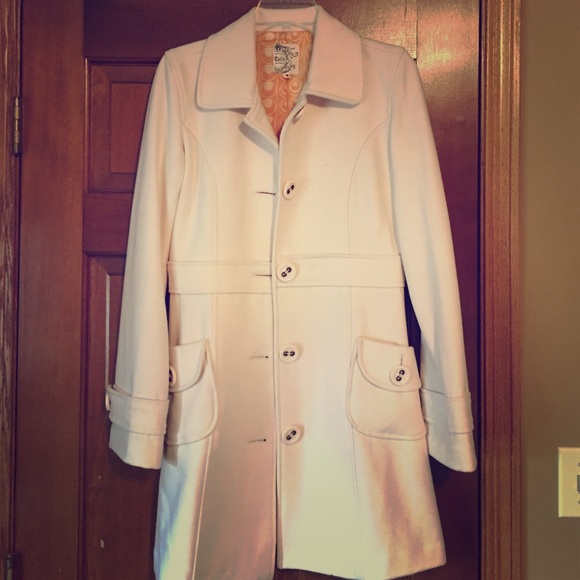 Cream/white long pea coat.